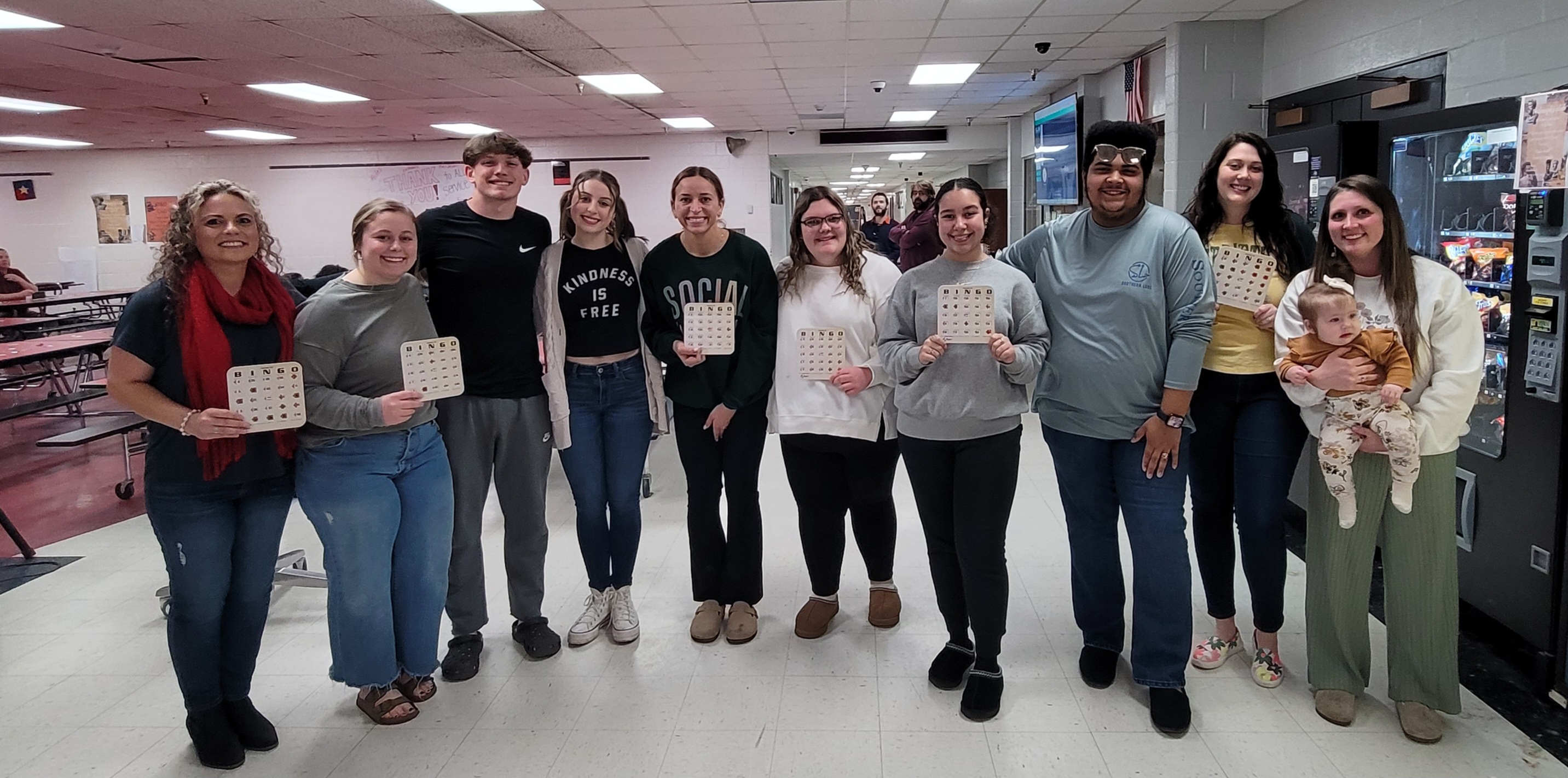 Group picture of students holding BINGO cards